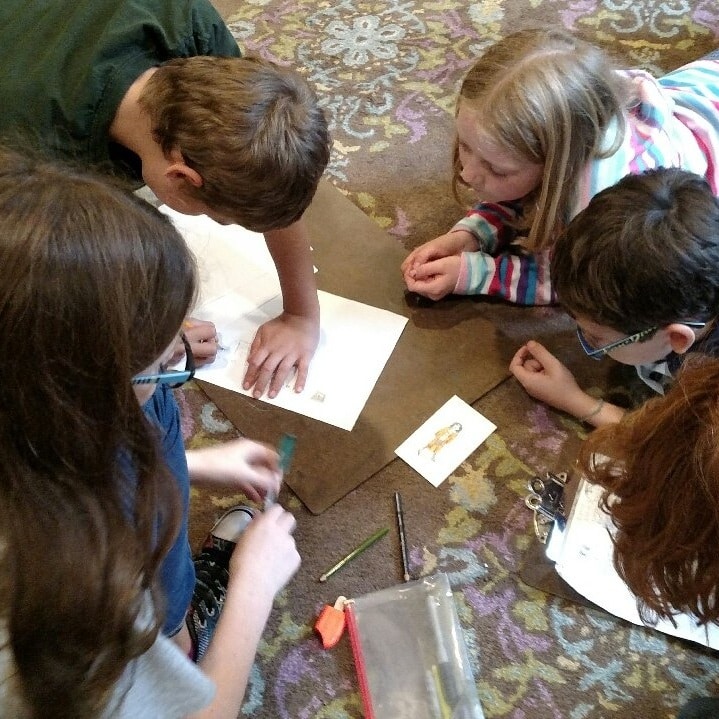 Students following the Montessori method at country village Montessori school